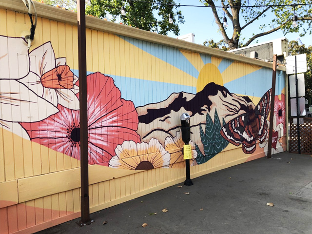 Mural by Ally McKay with flowers and butterflies